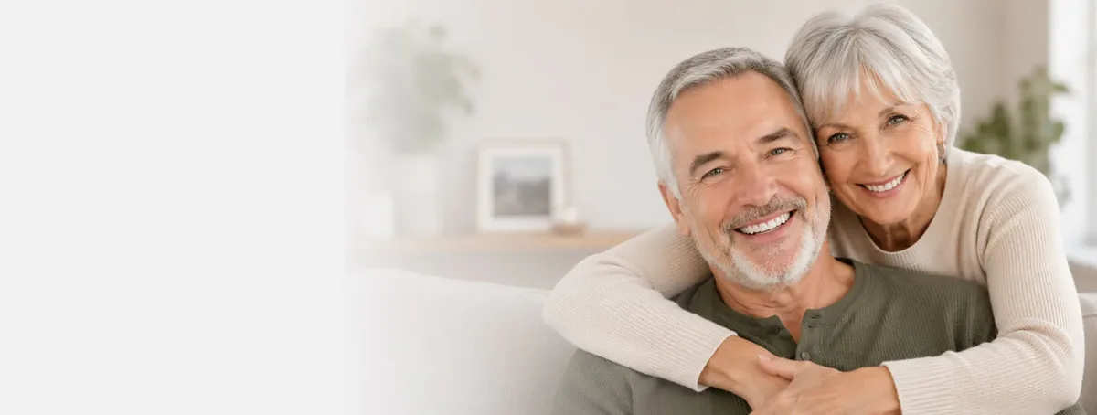 Happy senior couple with confident smiles — denture patients